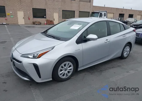 2021 Toyota Prius Le from USA, damaged, VIN JTDKAMFU2M3139056